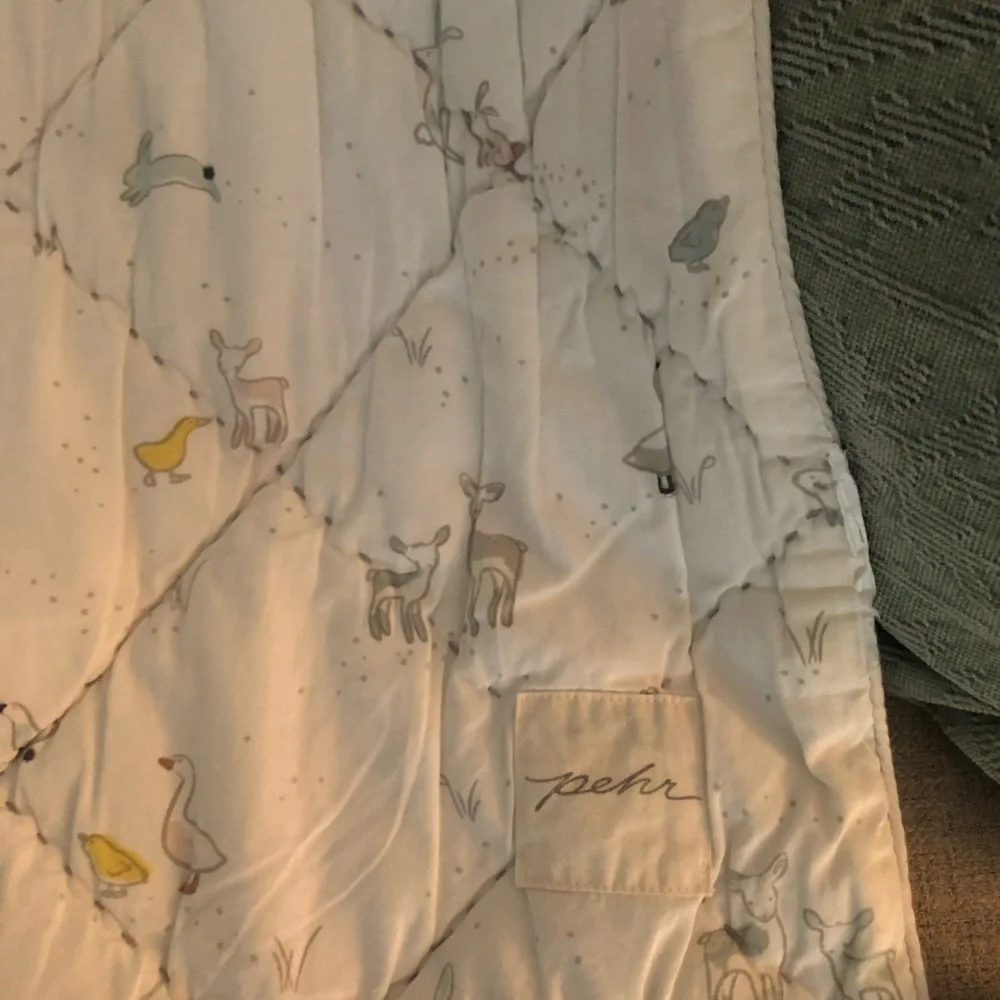 Quilted Baby Blanket in Soft Cream with Animal Motif